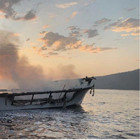 The fire-stricken Conception shortly before it sank off Santa Cruz Island in September 2019. All 33 passengers and one of six crewmembers died of smoke inhalation after they were trapped in the berthing area while a fire raged on the deck above. (Photo: Ventura County Fire Department)